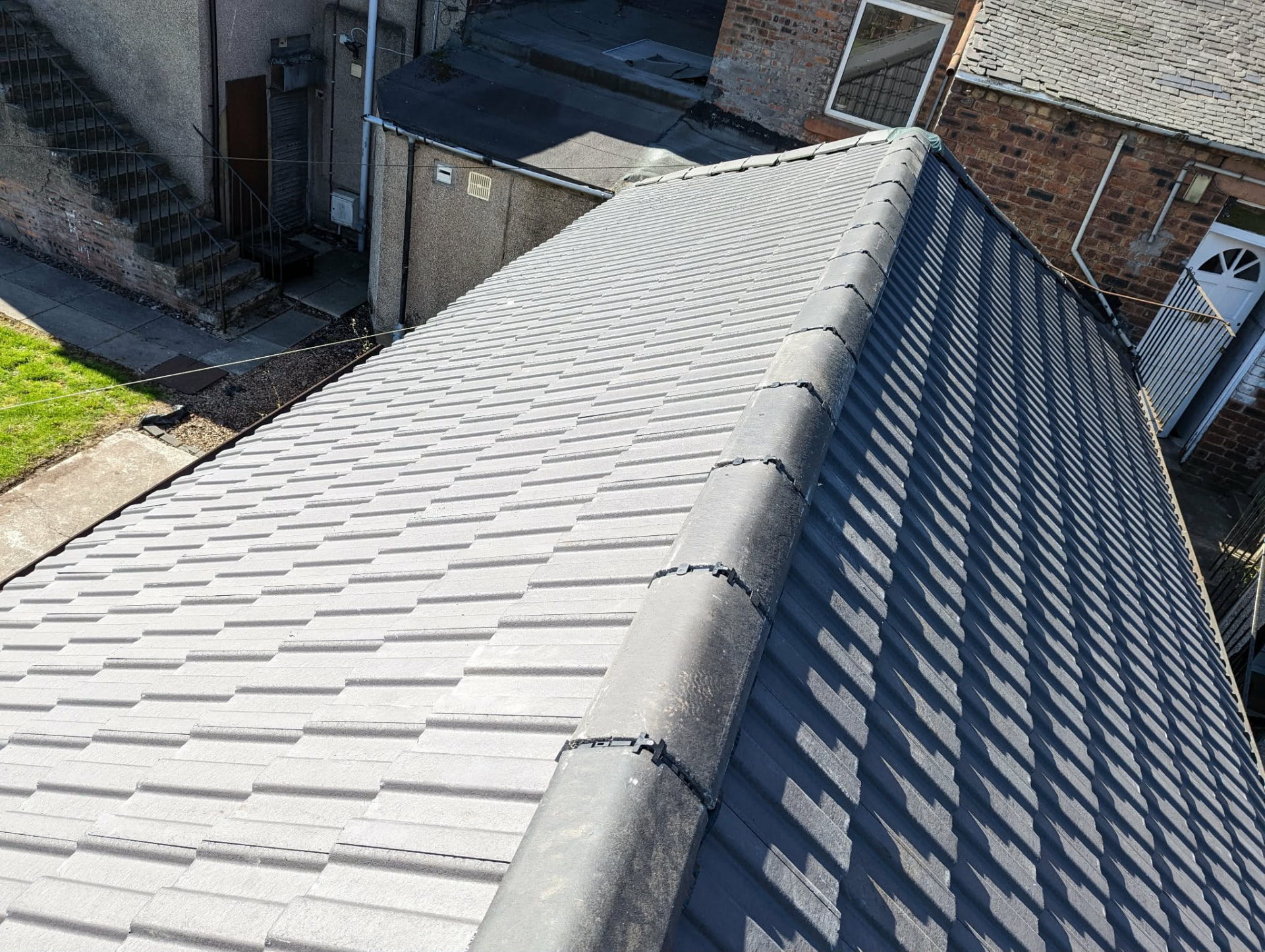 New concrete tile roof with ridge tiles on a Glasgow property