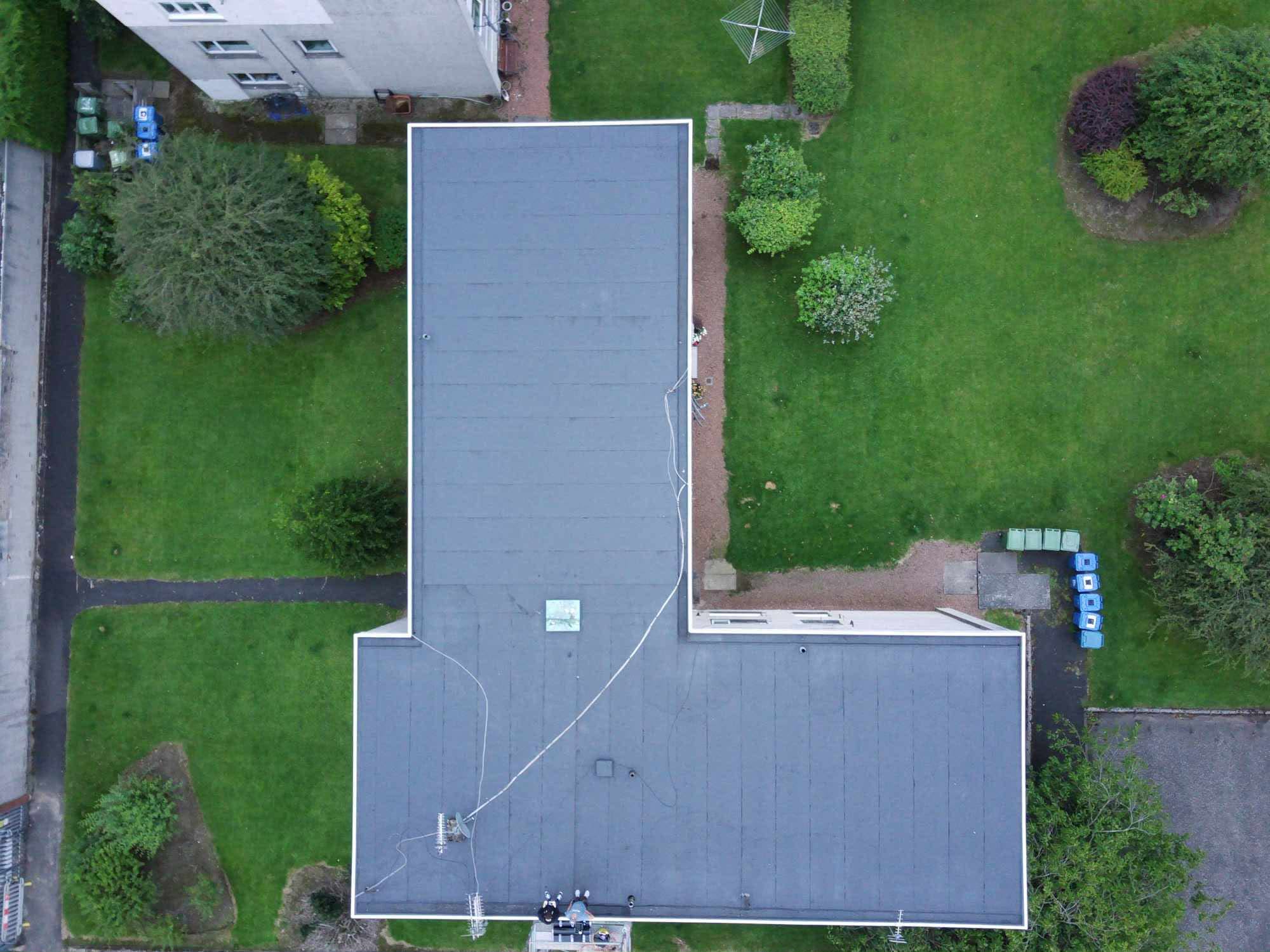 Overhead view of a completed flat roof replacement project
